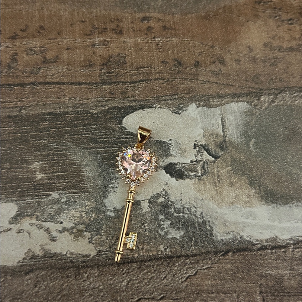 Gold plated Key Pendant with pink Heart Crystal